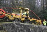 ION crew members lay fiber near Cranberry Lake, N.Y.