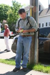 crew member uses GPS device