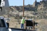 NTUA crew member strings fiber network lines in New Mexico.