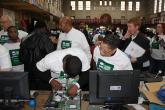 volunteers refurbishing computers