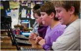 IMG: Students use netbooks to learn about online resources