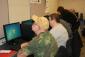 Image: Visitors explore the Internet during a computer class