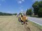 A crew prepares to lay new fiber