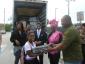 A family picks up its free desktop provided by LINK