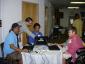 library staff helping people use computers