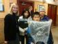 Image: A family picks up their new free computer