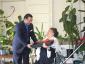 IMG: Galina Kharko receives a brand new laptop after completing digital literac