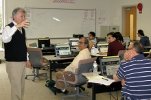 Henry Garcia teaches students computer basics at South Brunswick Public Library
